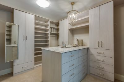 How Closet Installation Improves Home Organization